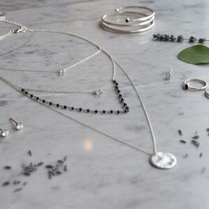 NWT Serefina Anthropologie triple layer hammered coin Crystal Necklace